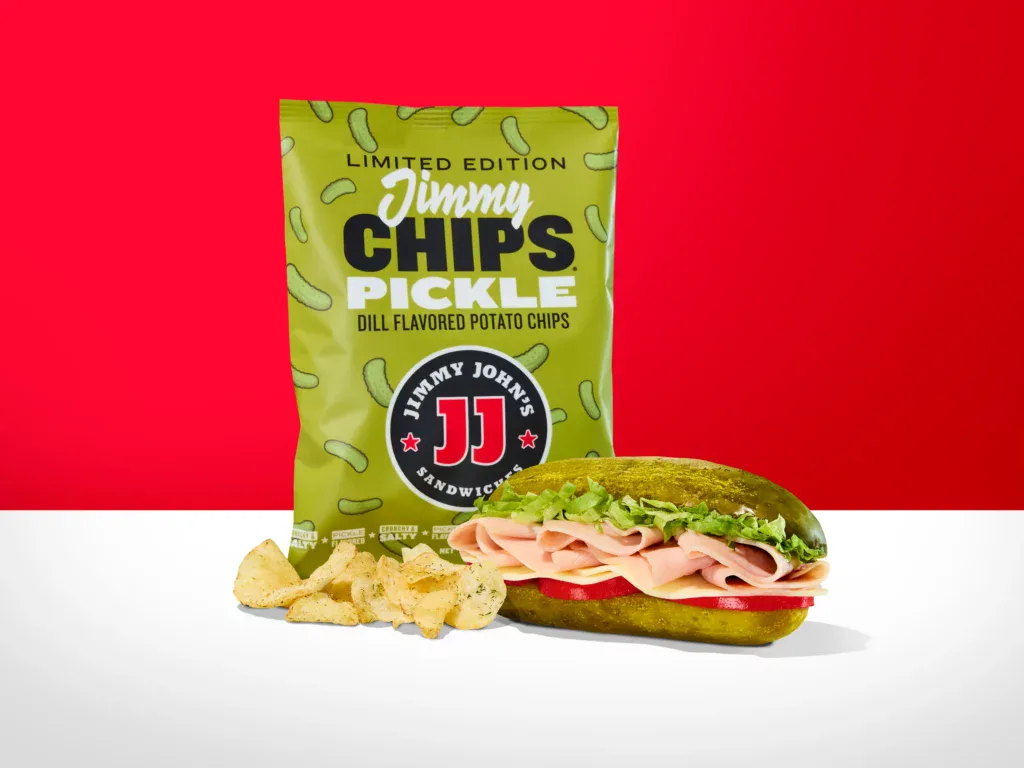 A sandwich being held together by pickles