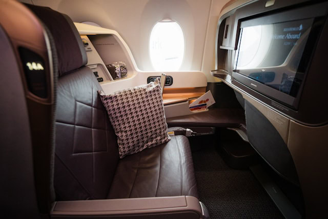 A first class seat in an airplane